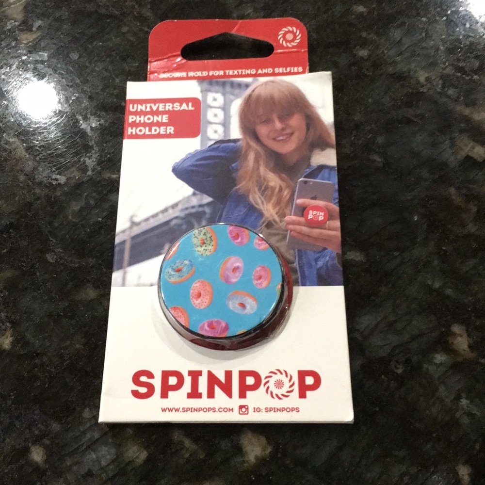 Spin pop universal phone holder